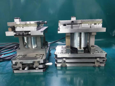 Four-axis double-head CNC clamp fixture